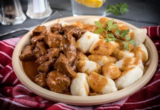 Slow-Cooked Beef Goulash with Homemade Potato Gnocchi