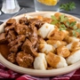 Slow-Cooked Beef Goulash with Homemade Potato Gnocchi